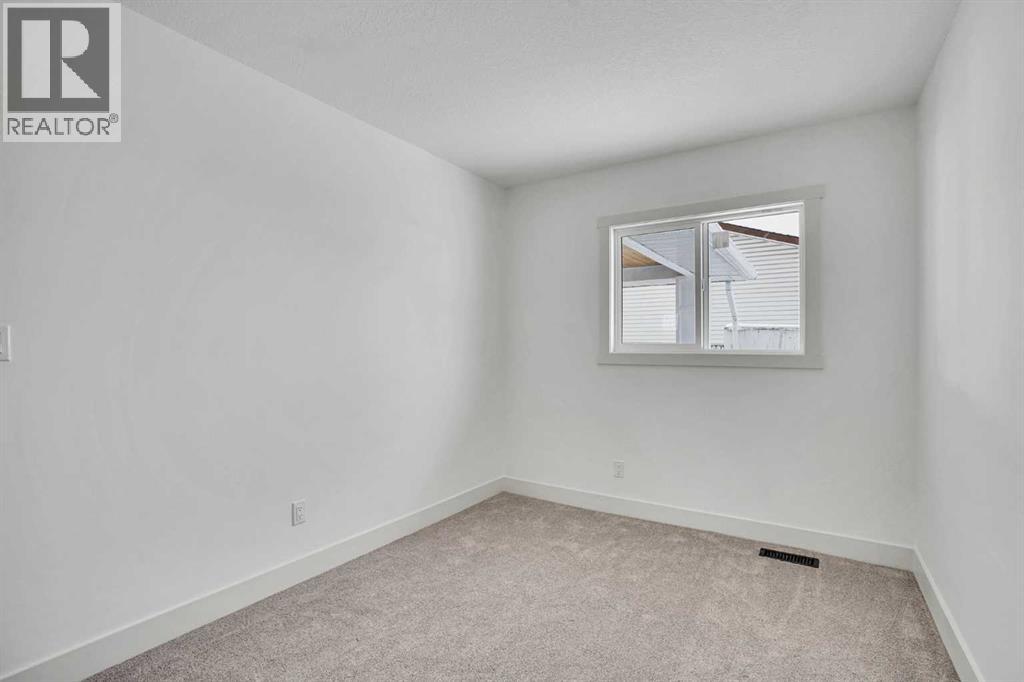 908 Stonehaven Road Sw, Calgary, Alberta  T2W 0P6 - Photo 16 - A2308929