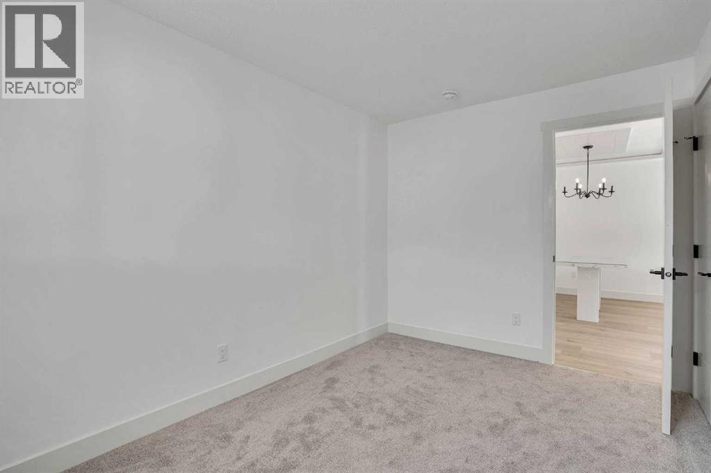 908 Stonehaven Road Sw, Calgary, Alberta  T2W 0P6 - Photo 18 - A2308929