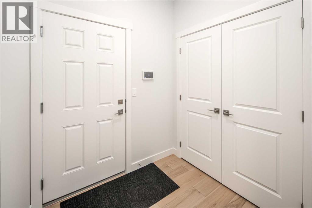 112 Creekstone Landing SW, Calgary, Alberta  T2X 5E6 - Photo 4 - A2283522
