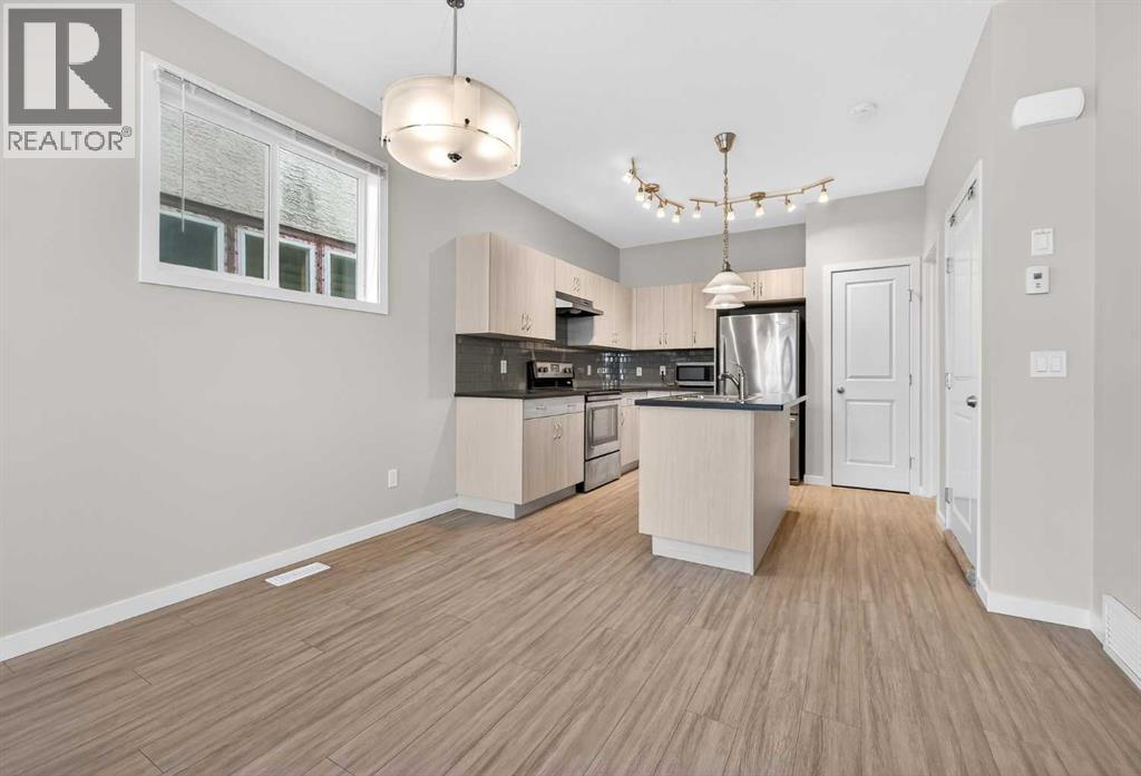 1607 2 Street NW, Calgary, Alberta  T2M 2W2 - Photo 8 - A2305939