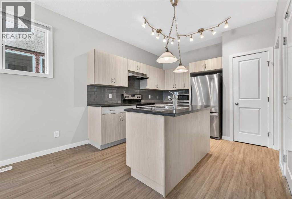 1607 2 Street NW, Calgary, Alberta  T2M 2W2 - Photo 9 - A2305939
