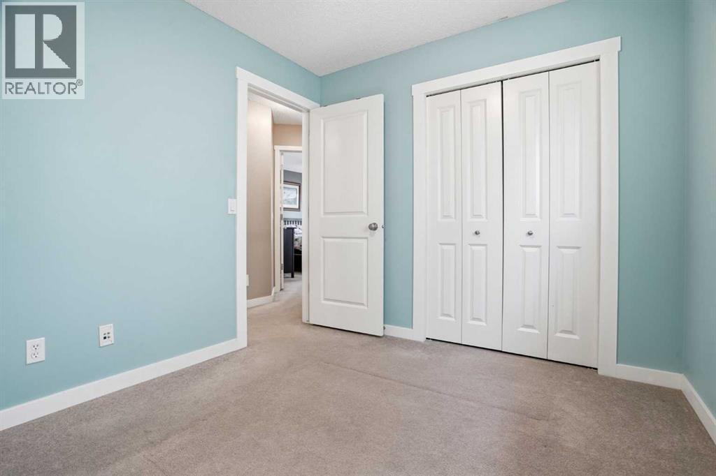 202 New Brighton Manor Se, Calgary, Alberta  T2Z 4J4 - Photo 32 - A2306864