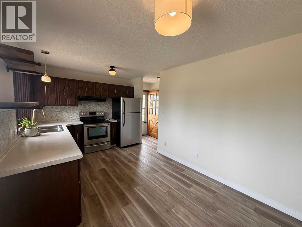 105 4th Avenue Sw, Falher, Alberta  T0H 1M0 - Photo 12 - A2308946