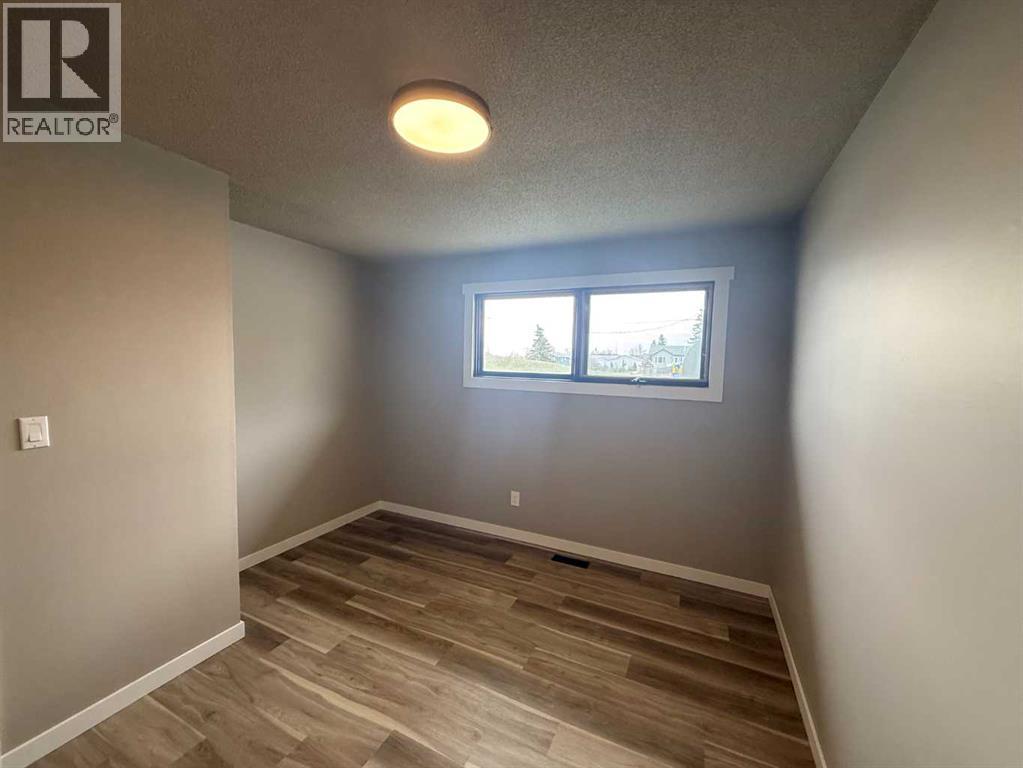 105 4th Avenue Sw, Falher, Alberta  T0H 1M0 - Photo 6 - A2308946