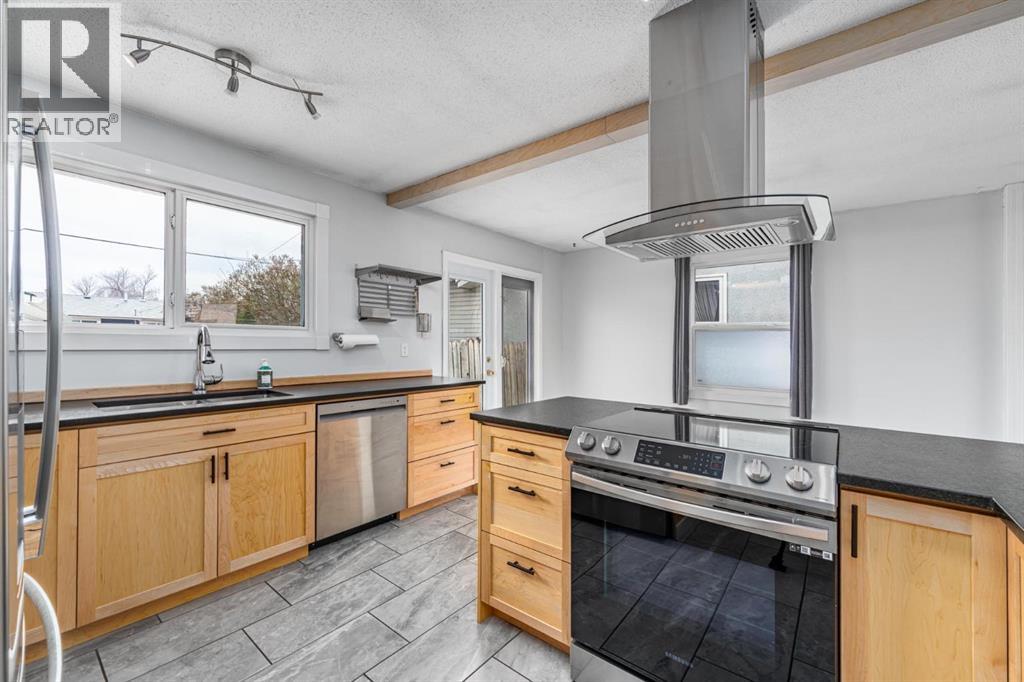 5207 5 Avenue Se, Calgary, Alberta  T2A 4X9 - Photo 13 - A2308700