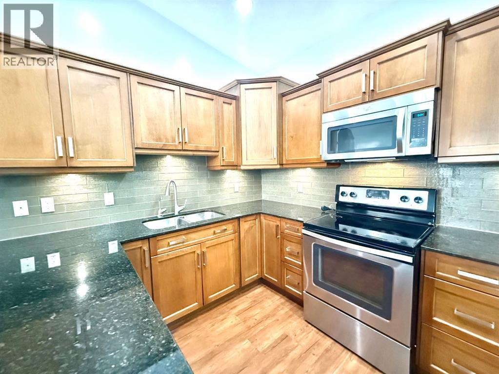 501 Sunvale Crescent Ne, High River, Alberta  T1V 0E8 - Photo 9 - A2303703