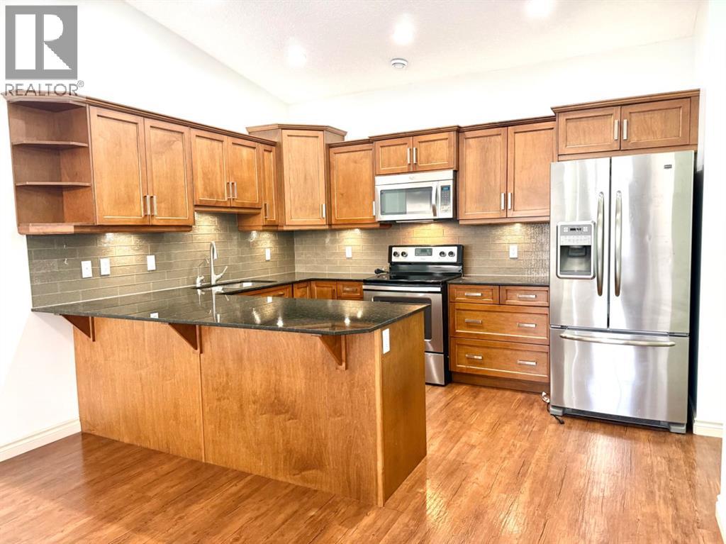 501 Sunvale Crescent Ne, High River, Alberta  T1V 0E8 - Photo 8 - A2303703