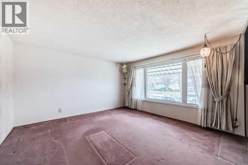165 Marbrooke Circle Ne, Calgary, Alberta  T2A 2W4 - Photo 10 - A2305860