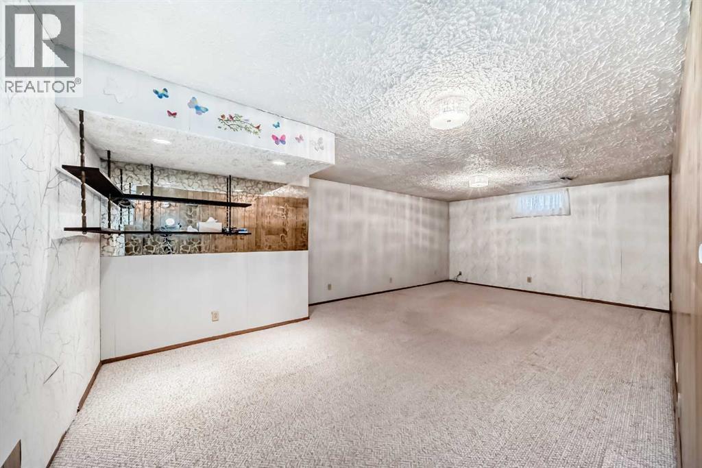 165 Marbrooke Circle Ne, Calgary, Alberta  T2A 2W4 - Photo 20 - A2305860