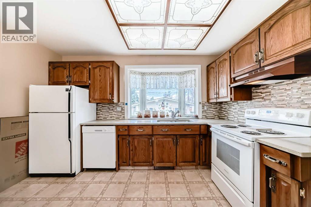 165 Marbrooke Circle Ne, Calgary, Alberta  T2A 2W4 - Photo 6 - A2305860