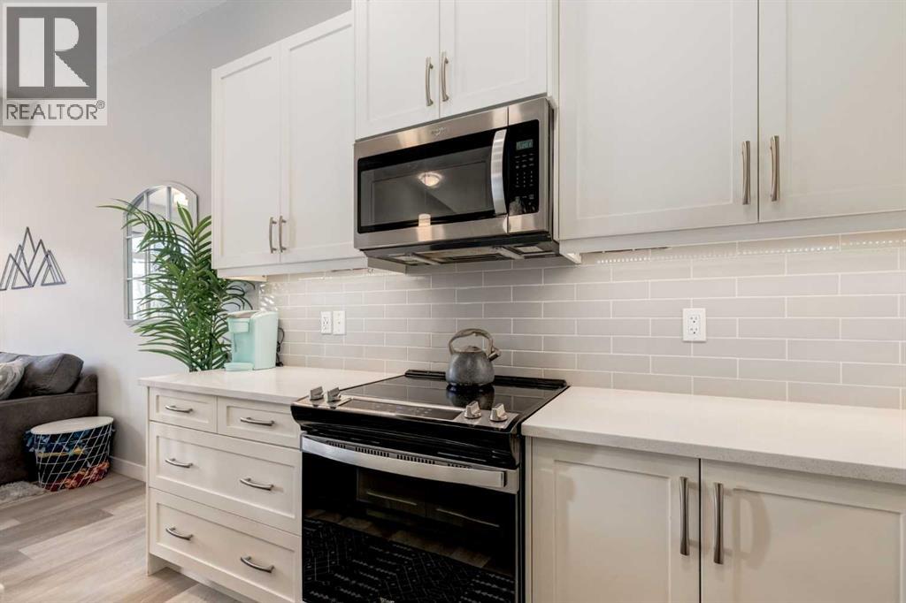 212 Crestbrook Common SW, Calgary, Alberta  T3B 6L1 - Photo 7 - A2308677