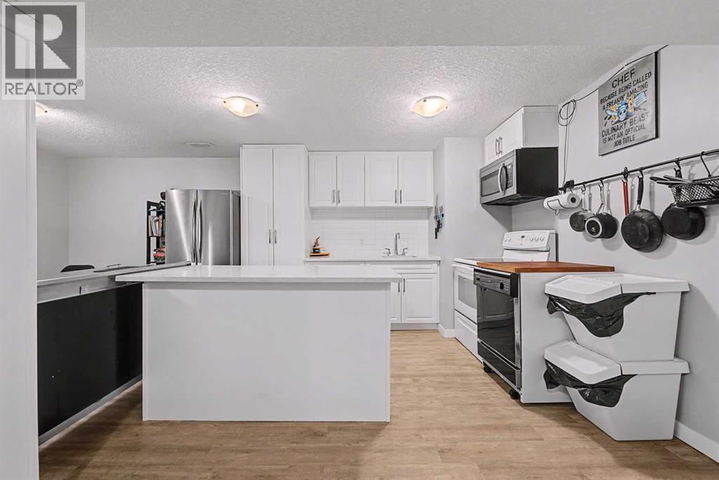 32 Sinclair Crescent SW, Calgary, Alberta  T2W 0L7 - Photo 28 - A2284512