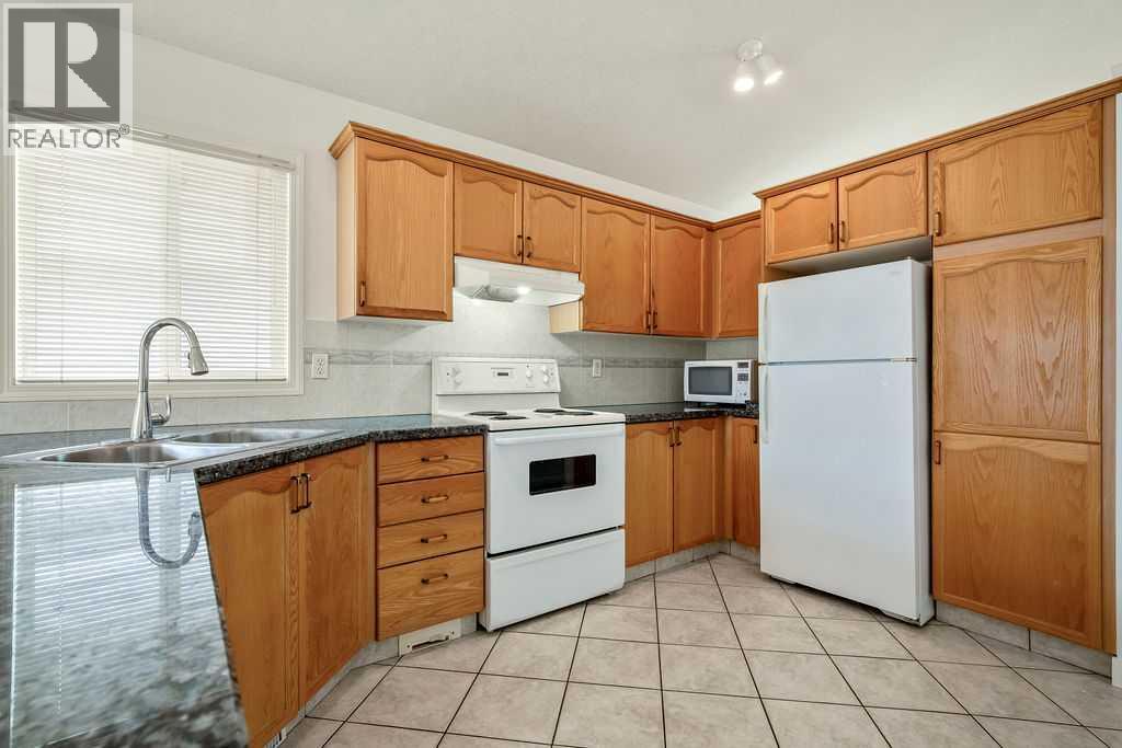 144 Covewood Close NE, Calgary, Alberta  T3K 4Z8 - Photo 8 - A2308367