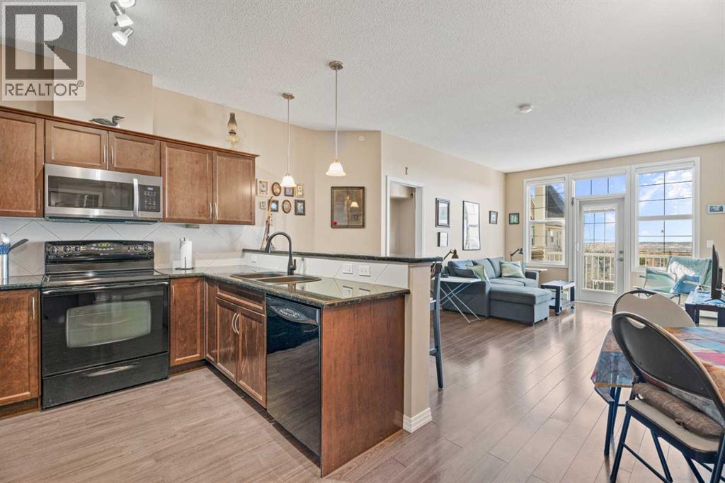 410, 1 Crystal Green Lane, Okotoks, Alberta  T1S 0C5 - Photo 1 - A2300391