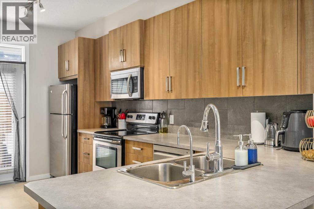 37 New Brighton Point SE, Calgary, Alberta  T2Z 1B6 - Photo 8 - A2292283