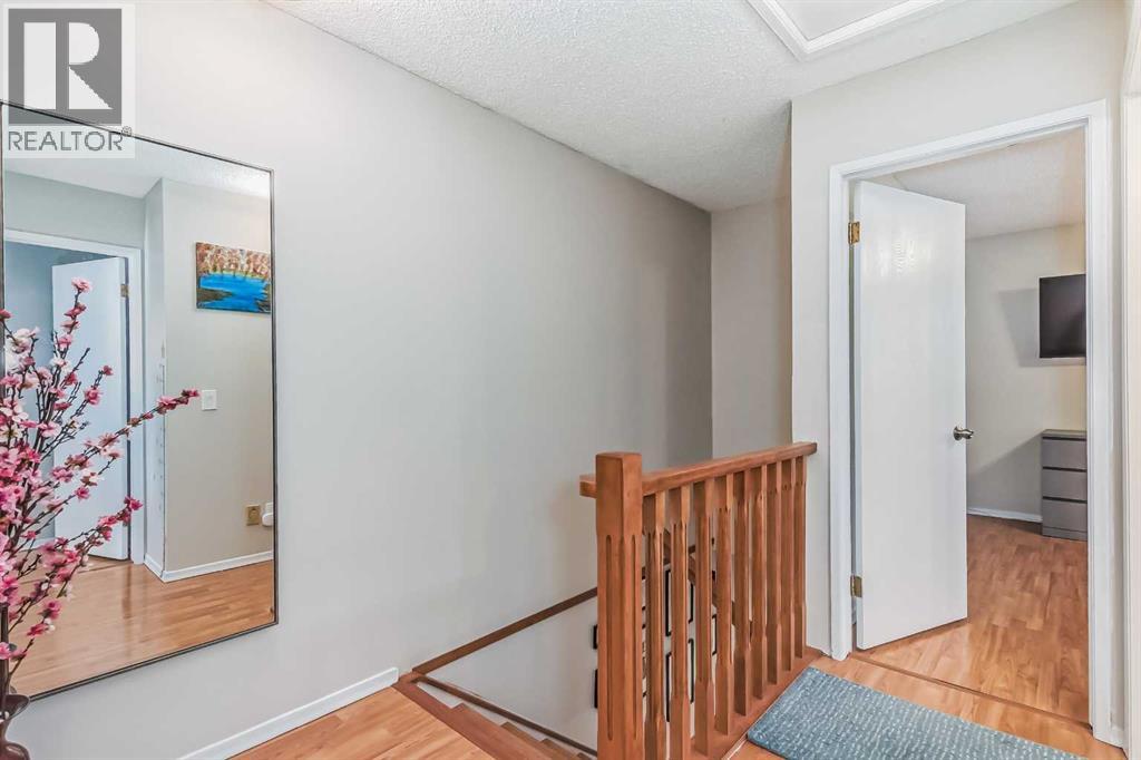 1451 Berkley Drive NW, Calgary, Alberta  T3K 1T6 - Photo 17 - A2273015