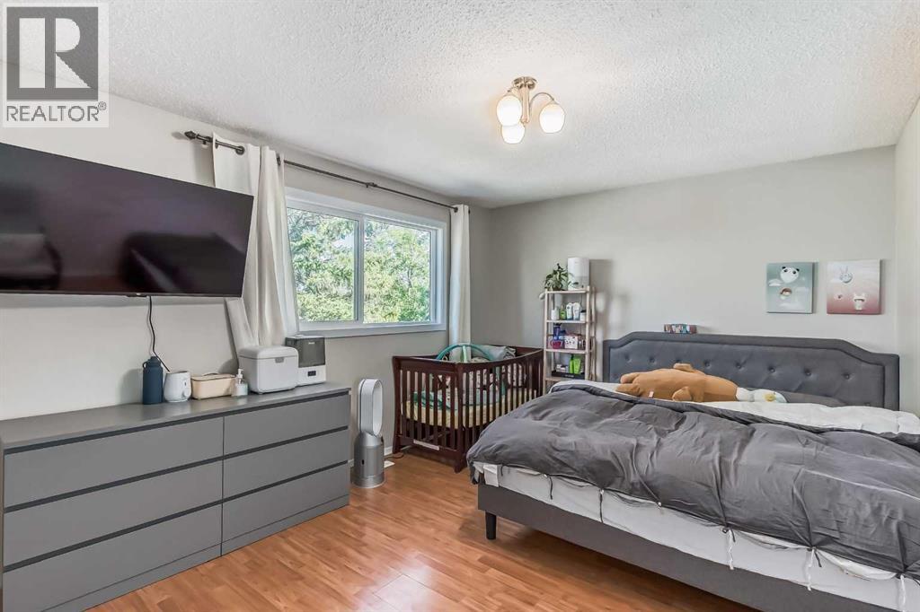 1451 Berkley Drive NW, Calgary, Alberta  T3K 1T6 - Photo 20 - A2273015