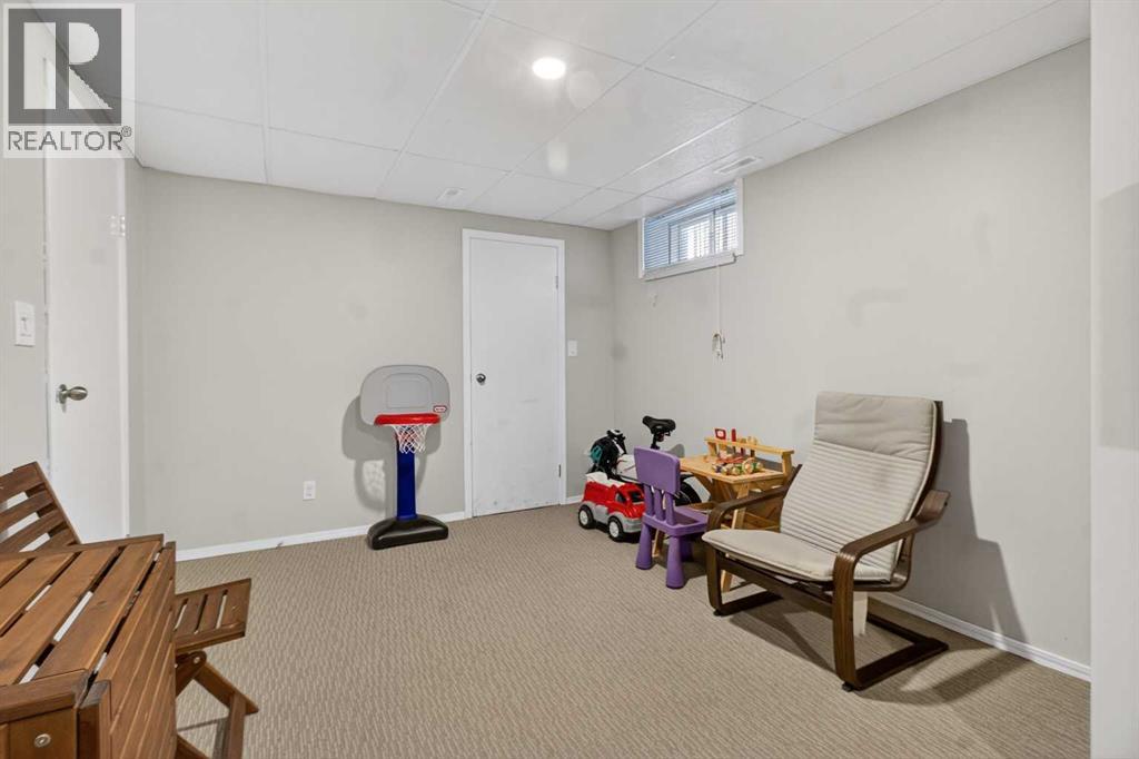 1451 Berkley Drive NW, Calgary, Alberta  T3K 1T6 - Photo 32 - A2273015