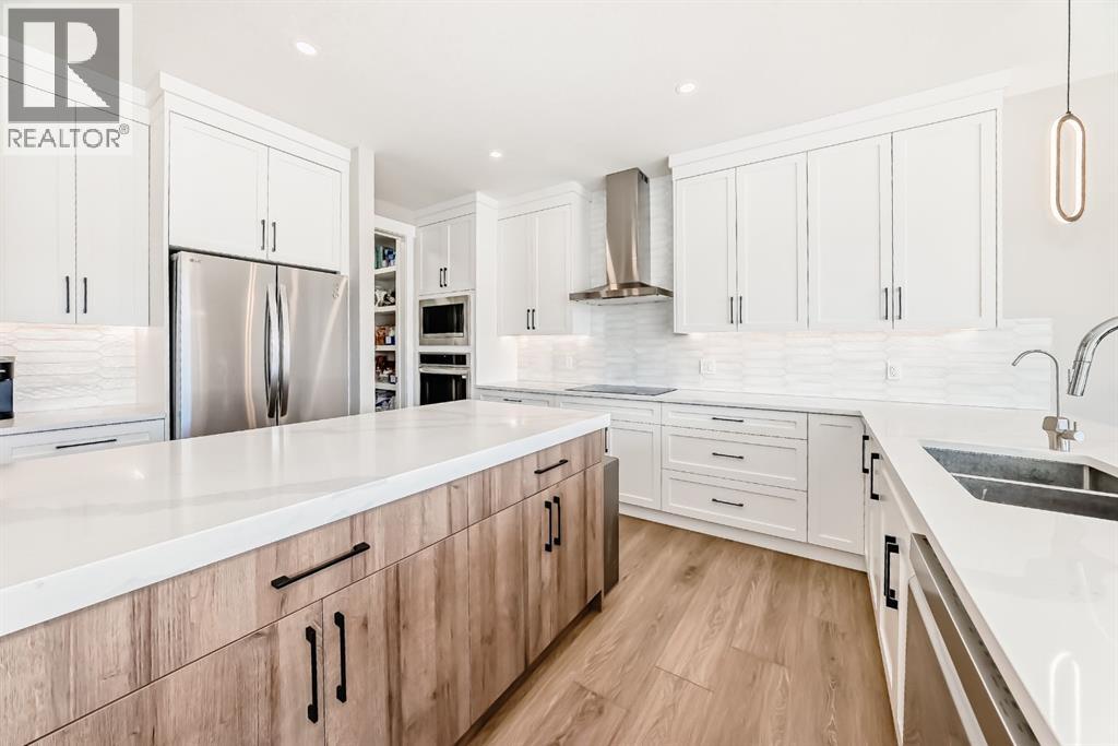 80 Vantage Drive, Cochrane, Alberta  T4C 3G2 - Photo 4 - A2306328