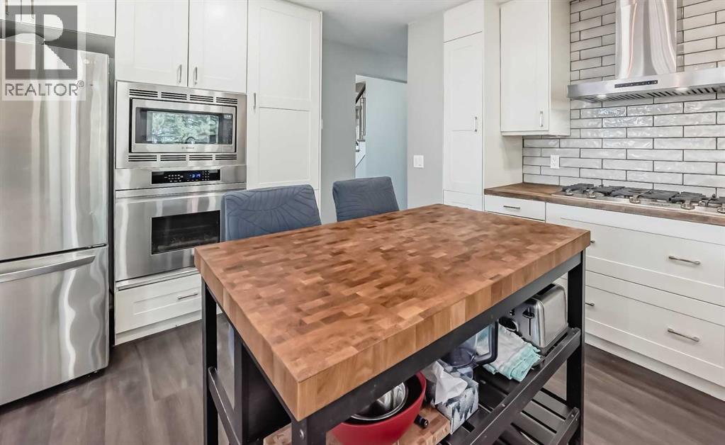 5512 Dalwood Way NW, Calgary, Alberta  T3A 1S7 - Photo 10 - A2308480