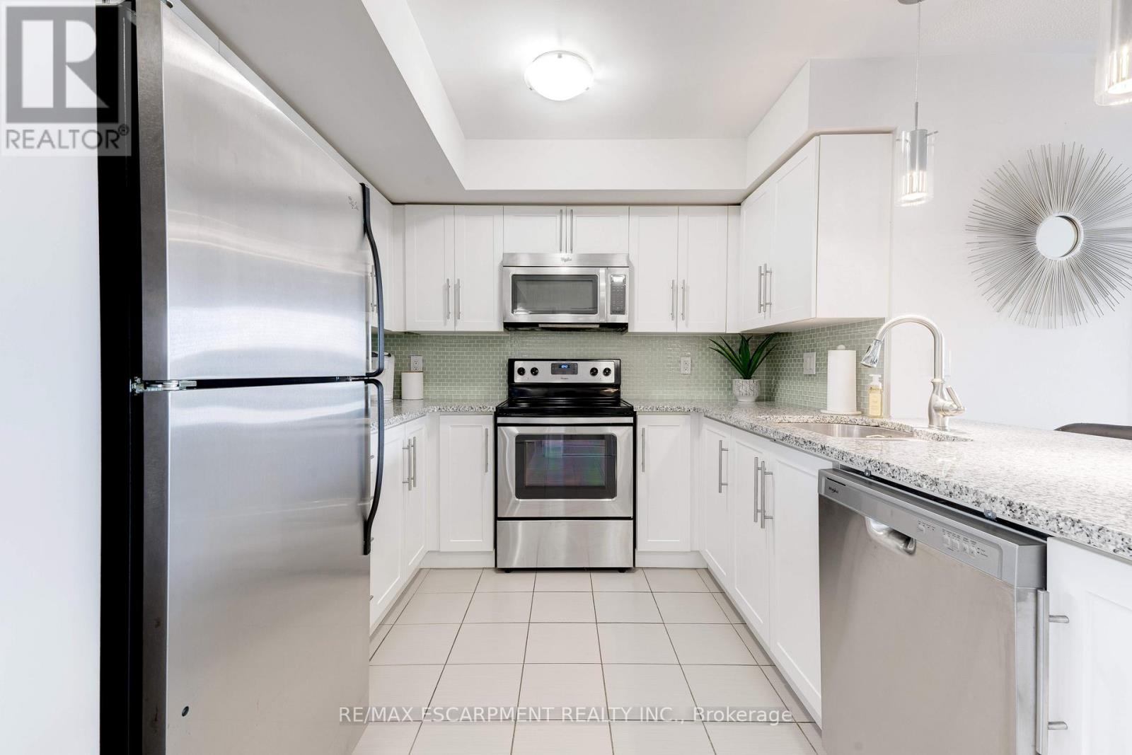 406 - 1045 Nadalin Heights, Milton, Ontario  L9T 8R5 - Photo 10 - W12924378