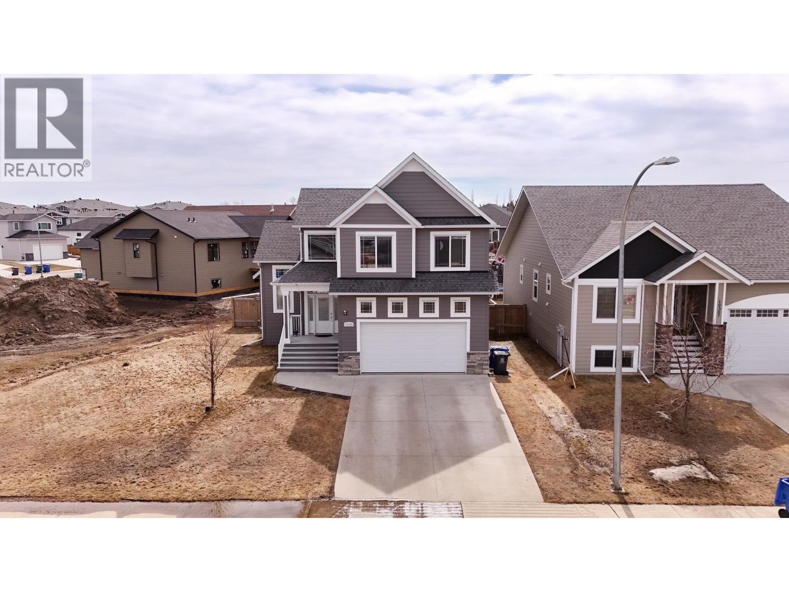 10303 117 Avenue, Fort St. John, British Columbia  V1J 0M8 - Photo 1 - R3120523