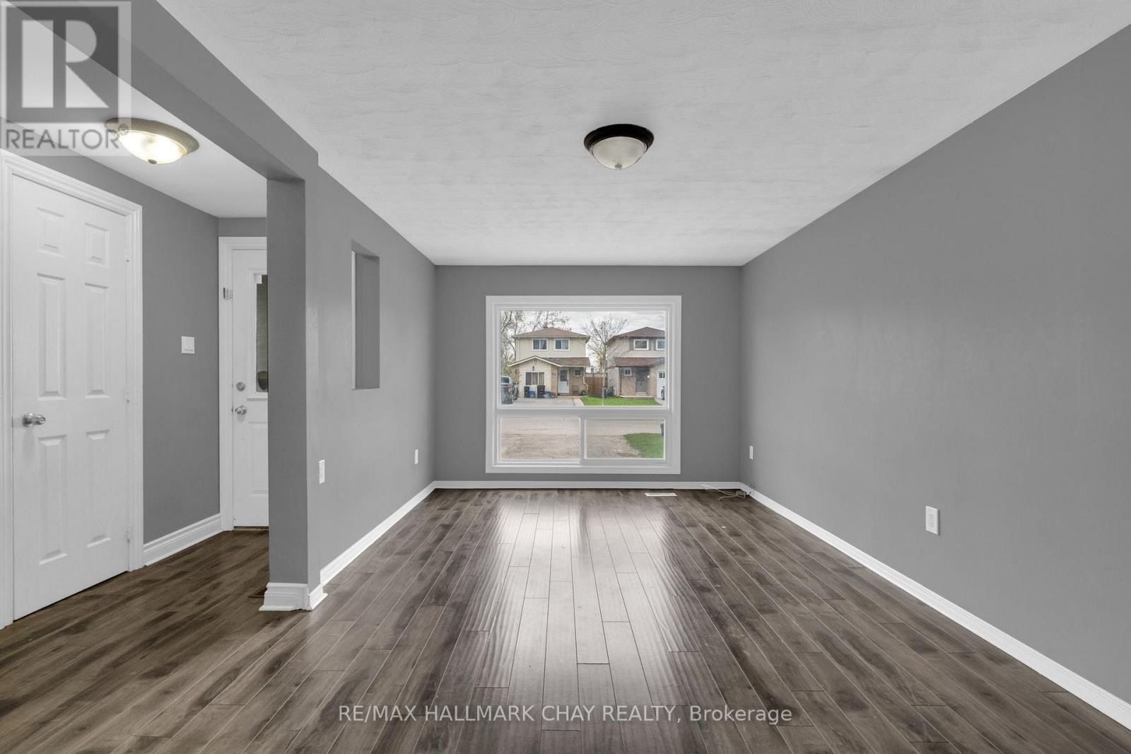 61 Corbett Drive, Barrie, Ontario  L4M 5V6 - Photo 4 - S13097756