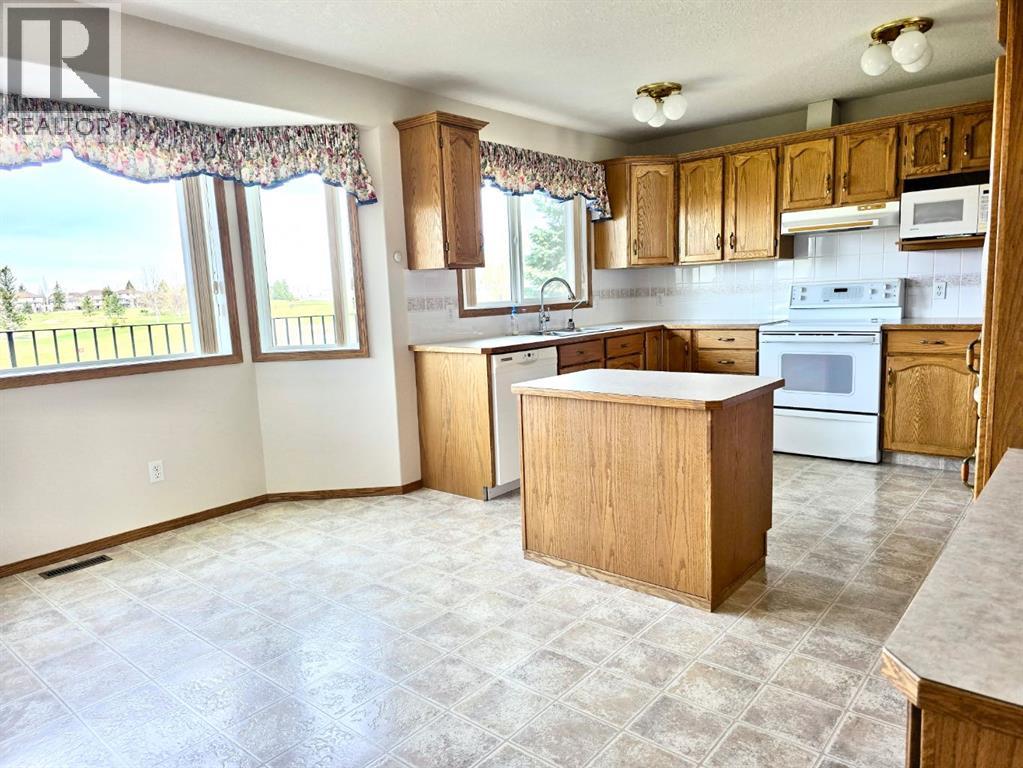 915 Highland Green Drive Nw, High River, Alberta  T1V 1V8 - Photo 9 - A2303971