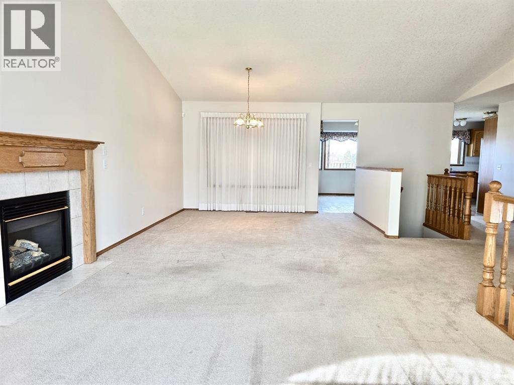 915 Highland Green Drive Nw, High River, Alberta  T1V 1V8 - Photo 7 - A2303971