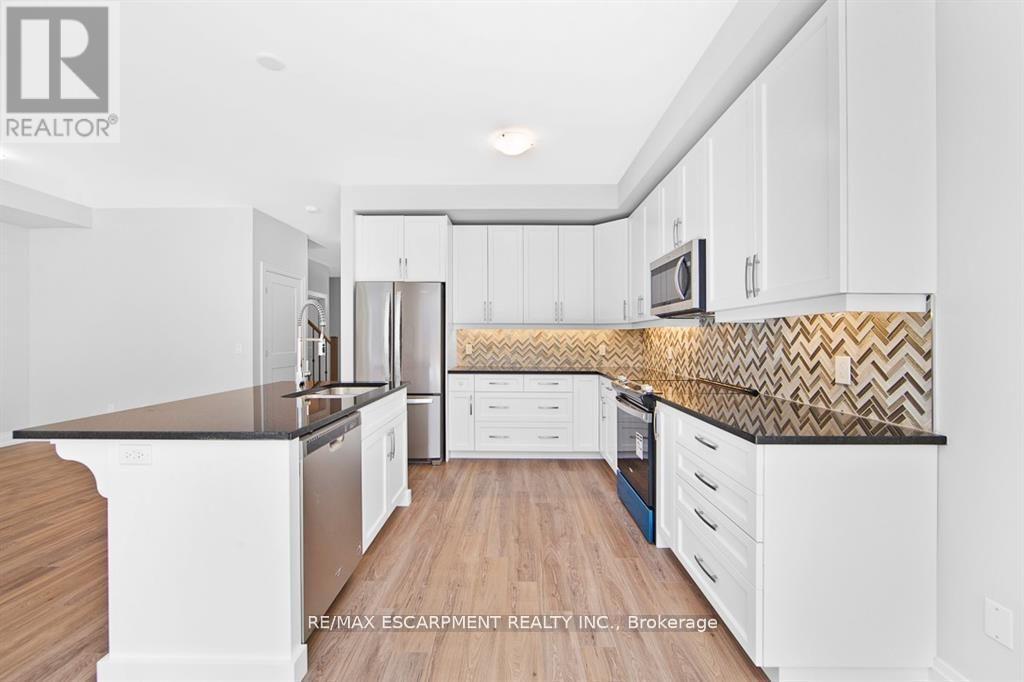 46 Kenesky Drive, Hamilton, Ontario  L8B 1Y2 - Photo 7 - X13097938
