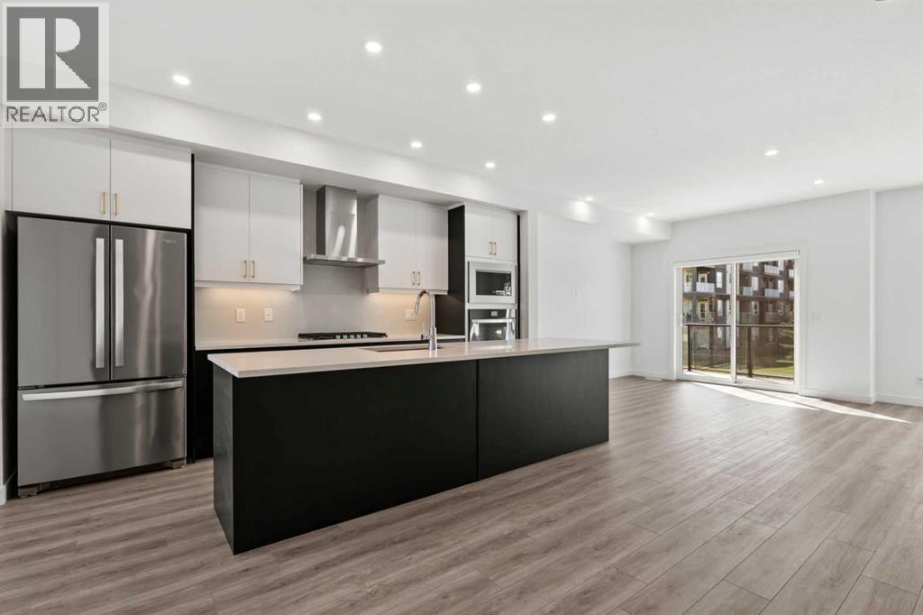 848 83 Street Sw, Calgary, Alberta  T3H 6M8 - Photo 4 - A2304737