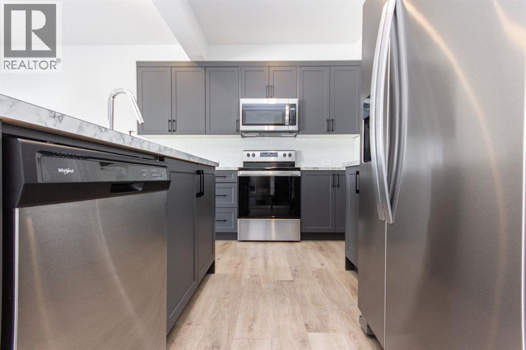 66 Henderson Crescent, Penhold, Alberta  T0M 1R0 - Photo 6 - A2290633