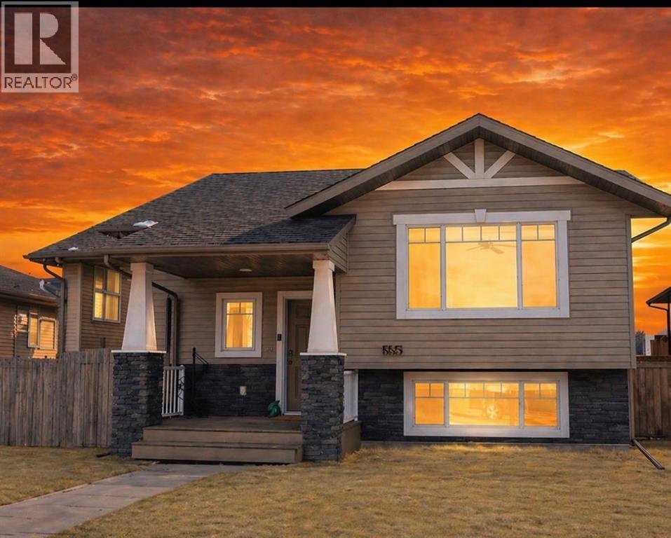 Welcome to this beautifully maintained and thoughtfully updated 4-bedroom, 2-bathroom home built in 2011, offering the perfect blend of comfort, functionality, and modern style. From the moment you step inside, you’ll appreciate the bright, open-concept main floor featuring new flooring, fresh paint, and a layout designed for both everyday living and entertaining.The spacious kitchen flows seamlessly into the living and dining areas, creating a warm and inviting atmosphere ideal for hosting family and friends. Downstairs, the fully finished basement provides additional living space—perfect for a family room, home office, or guest retreat.Step outside to enjoy the sunny south-facing deck, constructed with upgraded durable fiberglass, overlooking a fully fenced backyard—ideal for kids, pets, and summer BBQs. The yard also includes a shed, treehouse, and plenty of room to build your dream garage, with convenient alley access and rear parking already in place. (id:48254)