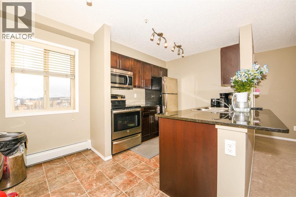 302, 5 Saddlestone Way Ne, Calgary, Alberta  T3J 0S2 - Photo 8 - A2308817
