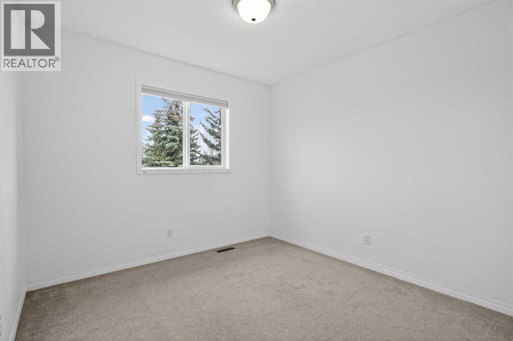8050 Cougar Ridge Avenue SW, Calgary, Alberta  T3H 5S5 - Photo 22 - A2307954