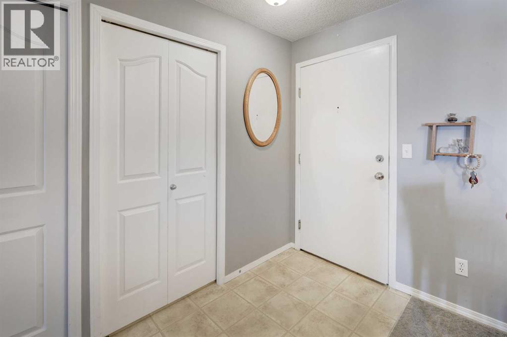 7303, 304 Mackenzie Way Sw, Airdrie, Alberta  T4B 3H7 - Photo 4 - A2296988
