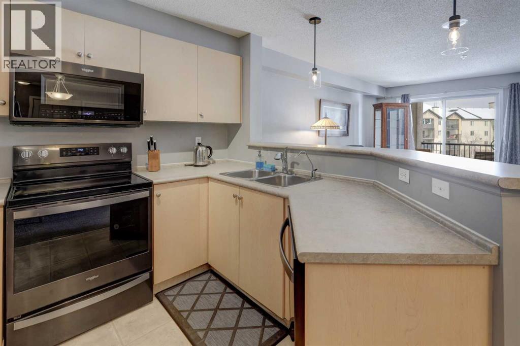 7303, 304 Mackenzie Way Sw, Airdrie, Alberta  T4B 3H7 - Photo 9 - A2296988
