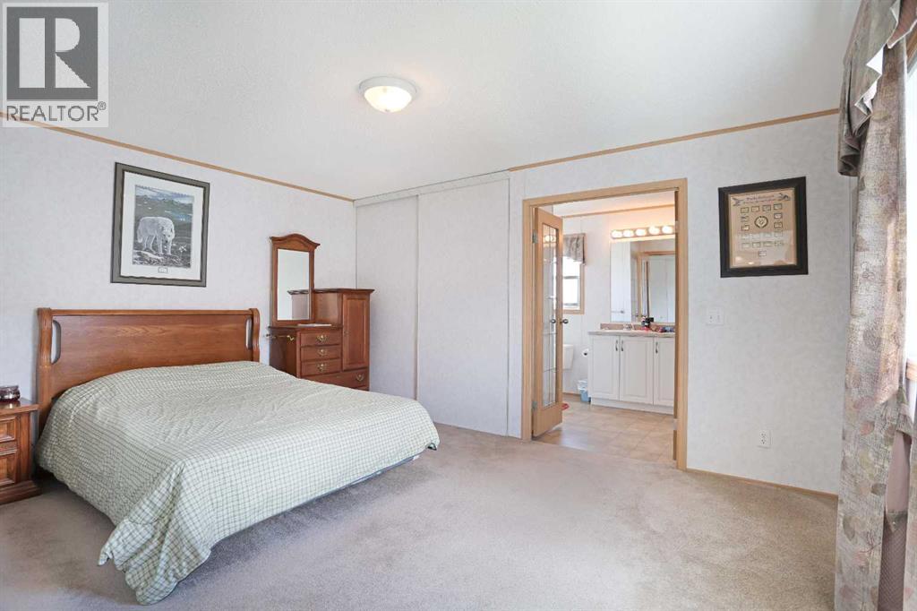 45 Meadowplace Crescent E, Brooks, Alberta  T1R 0R5 - Photo 10 - A2306859