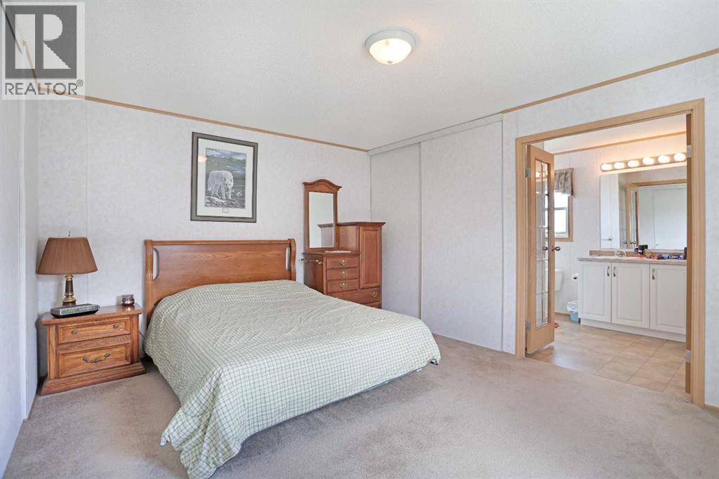 45 Meadowplace Crescent E, Brooks, Alberta  T1R 0R5 - Photo 11 - A2306859