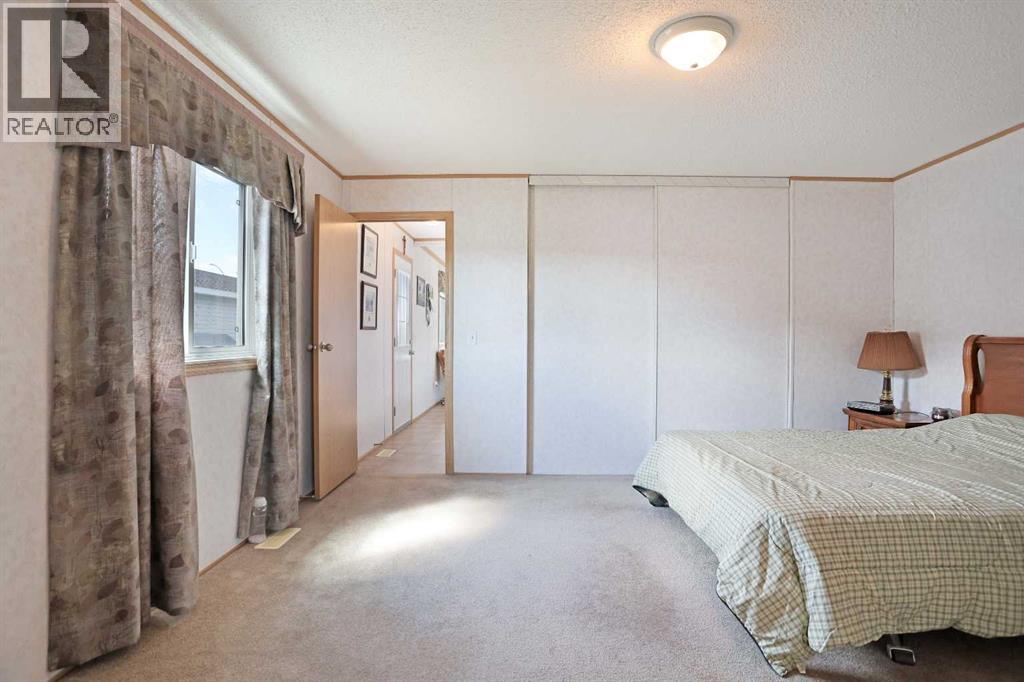 45 Meadowplace Crescent E, Brooks, Alberta  T1R 0R5 - Photo 14 - A2306859