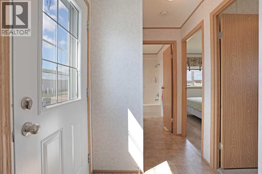 45 Meadowplace Crescent E, Brooks, Alberta  T1R 0R5 - Photo 18 - A2306859