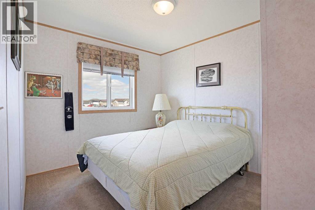 45 Meadowplace Crescent E, Brooks, Alberta  T1R 0R5 - Photo 19 - A2306859