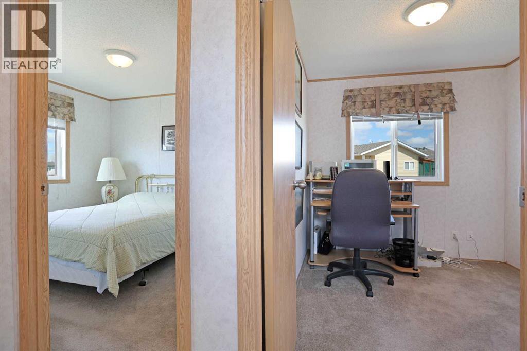 45 Meadowplace Crescent E, Brooks, Alberta  T1R 0R5 - Photo 21 - A2306859