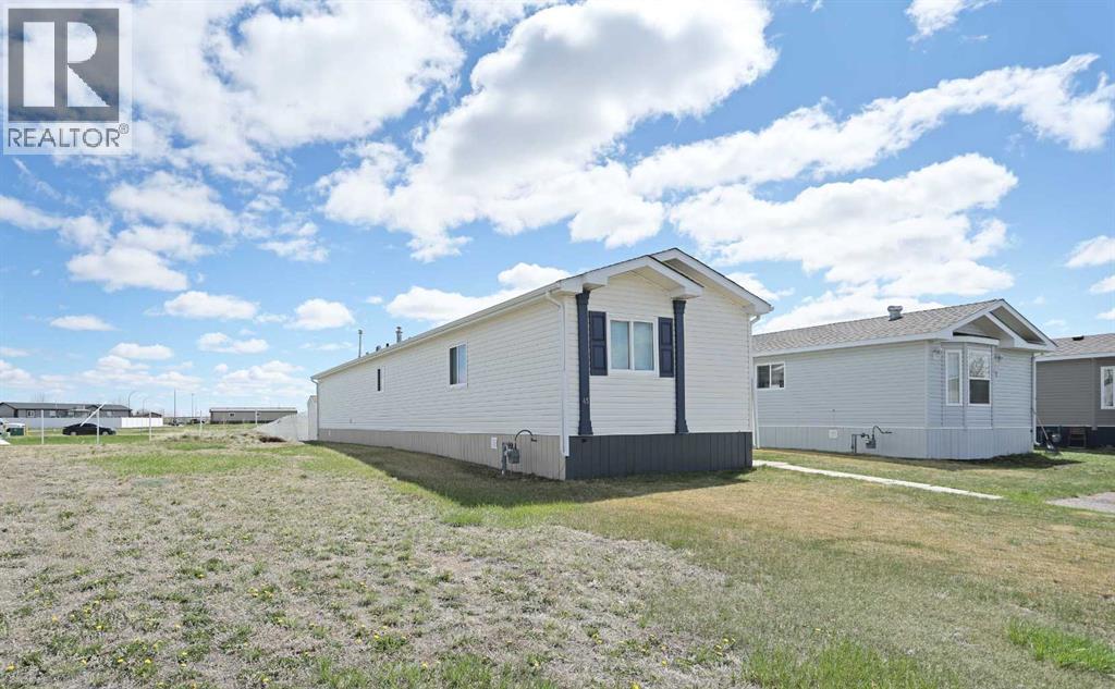45 Meadowplace Crescent E, Brooks, Alberta  T1R 0R5 - Photo 28 - A2306859