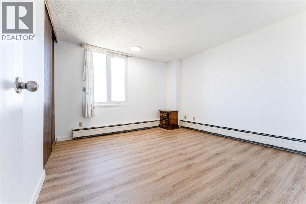 802, 4944 Dalton Drive NW, Calgary, Alberta  T3A 2E6 - Photo 15 - A2308921