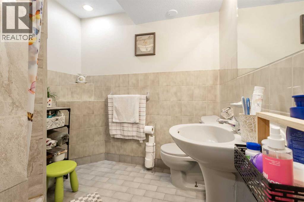 112 Woodglen Road SW, Calgary, Alberta  T2W 4Z1 - Photo 40 - A2308841