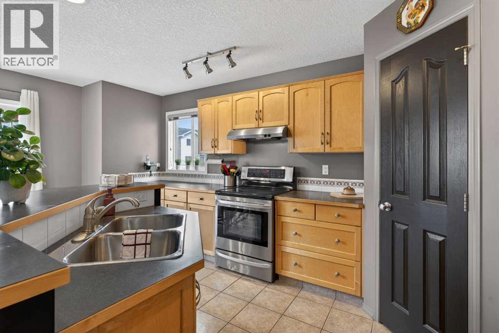 204 Citadel Meadow Close Nw, Calgary, Alberta  T3G 4T4 - Photo 12 - A2306097