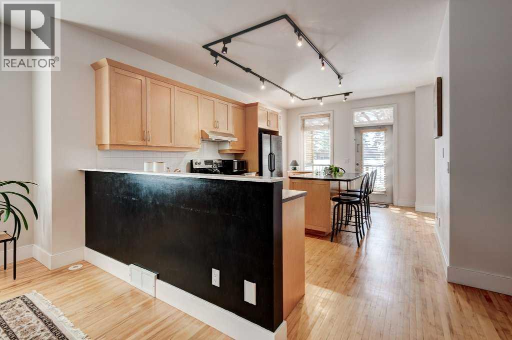 703 52 Avenue SW, Calgary, Alberta  T2V 0B6 - Photo 7 - A2299270