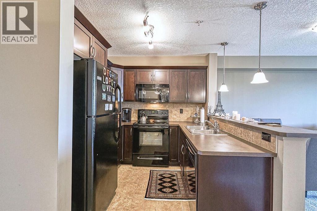 1304, 175 Panatella Hill Nw, Calgary, Alberta  T3K 0V9 - Photo 10 - A2307309