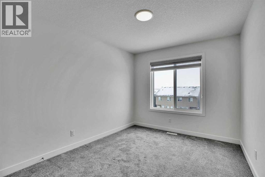 26 Amblehurst Path NW, Calgary, Alberta  T3P 1W8 - Photo 25 - A2297433